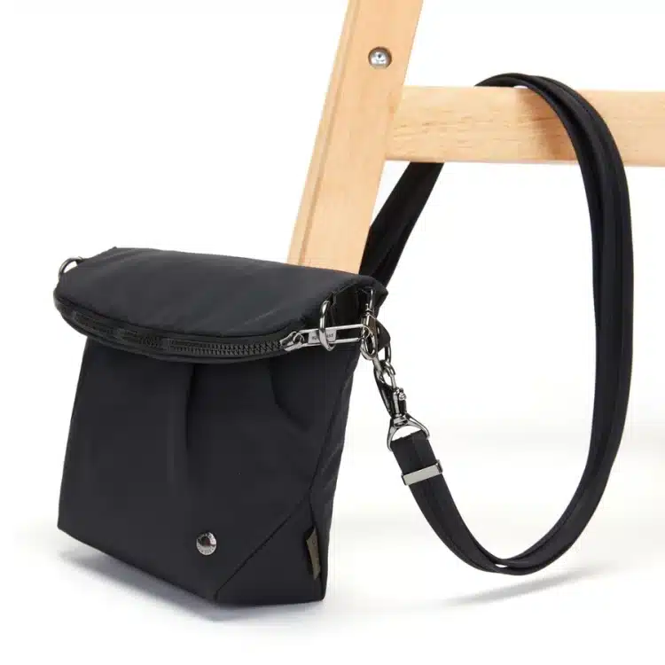 Pacsafe CX Anti-Theft Convertible Crossbody Travel Bag - Black on Chair
